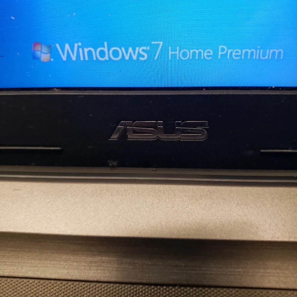ASUS Silver Laptop with Black Keyboard WORKING